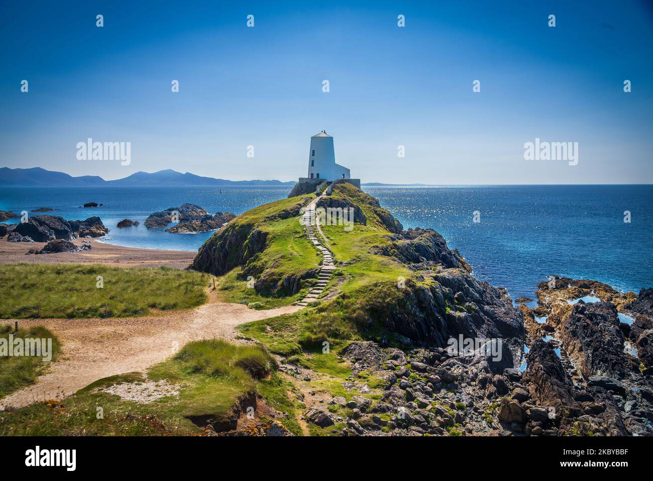 Llanddwyn Island (Ynys Llanddwyn). Anglesey North Wales. Tŵr Mawr lighthouse was modelled on the windmills of Anglesey, was built in 1845. Stock Photo