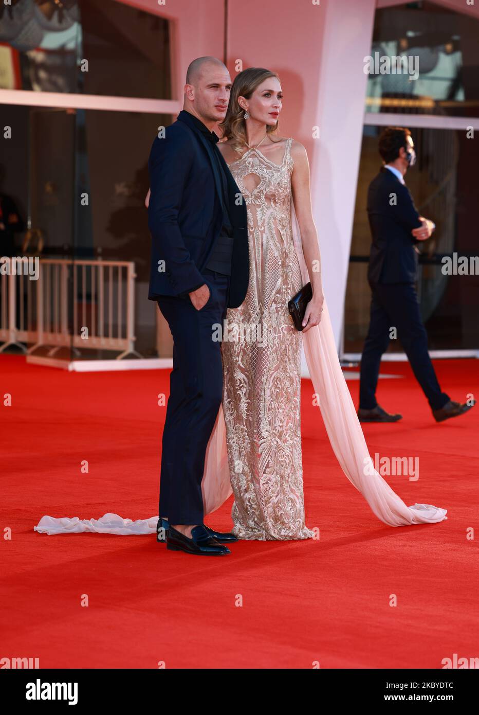 Samuele Riva and Barbara Romer walk the red carpet ahead of the movie ''Notturno'' at the 77th Venice Film Festival on September 08, 2020 in Venice, Italy. (Photo by Matteo Chinellato/NurPhoto) Stock Photo