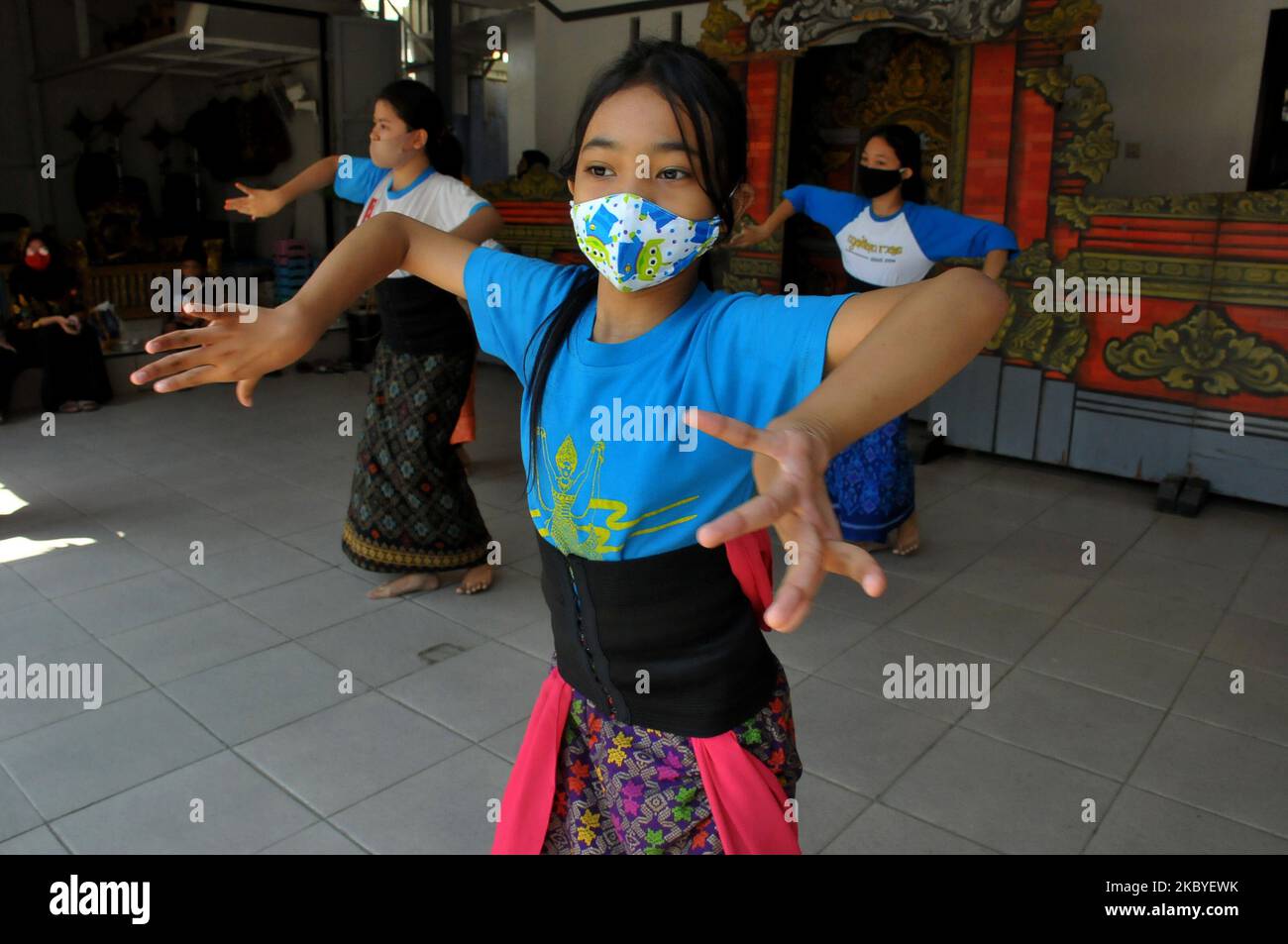 Activities of Balinese villagers during the pandemic in Harapan Jaya in Bekasi City, West Java, On September 9,2020. The existence of this village is thick with Bali culture, because the majority of residents in the neighborhood, 60 percent are Balinese. The advantage of this place is that it has the beauty and hydroponic plants that grow in almost every resident's house as well as the diversity of different beliefs, but still upholds community harmony where children can learn Bali art and it is open to guests who will learn art, besides that it looks like women wearing traditional clothes typ Stock Photo