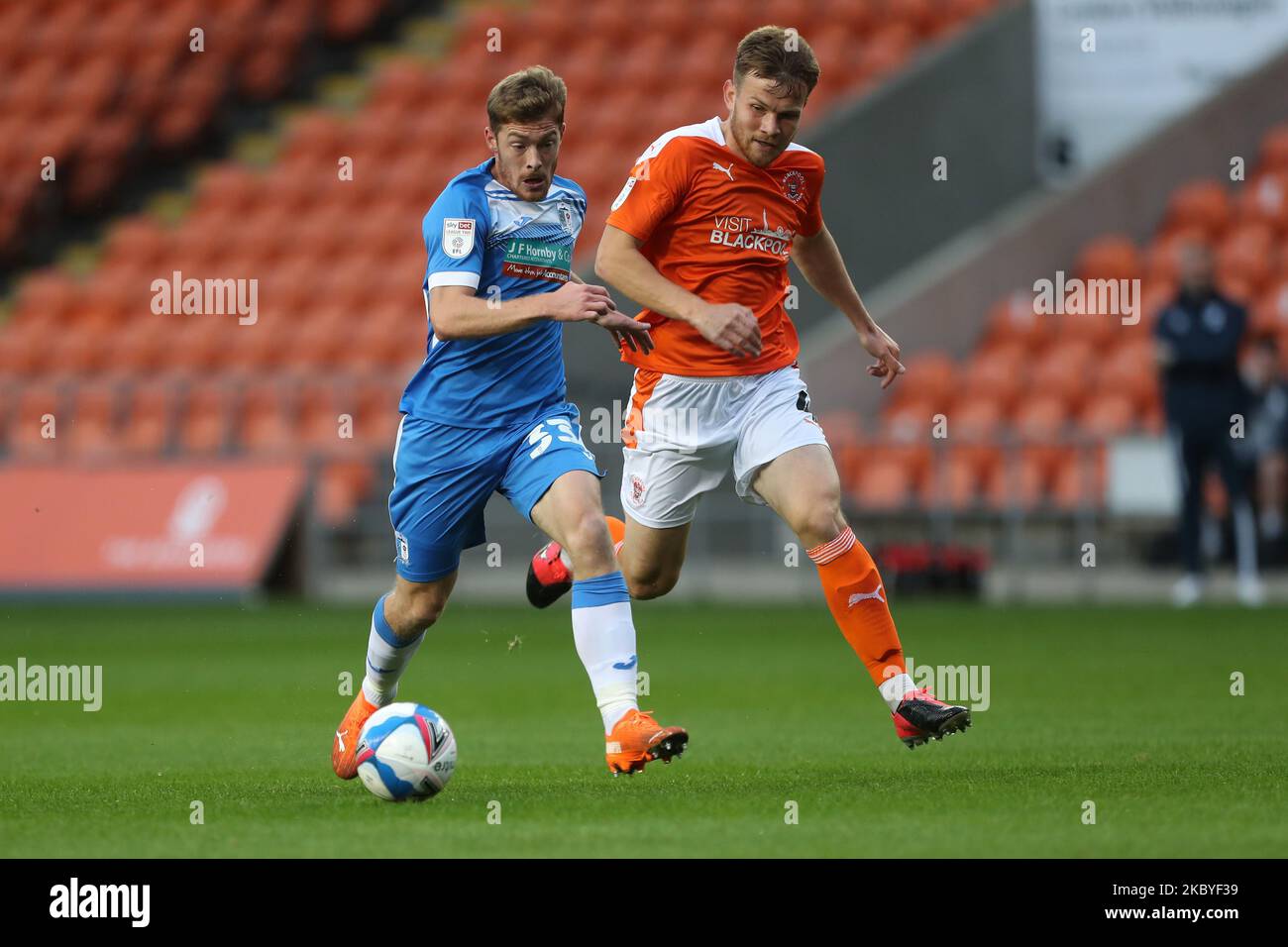 Barrow Luke James in action with Blackpool's Jordan Thorniley during the EFL Trophy match between Blackpool and Barrow at Bloomfield Road, Blackpool, England, on September 8, 2020. (Photo by Mark Fletcher/MI News/NurPhoto) Stock Photo