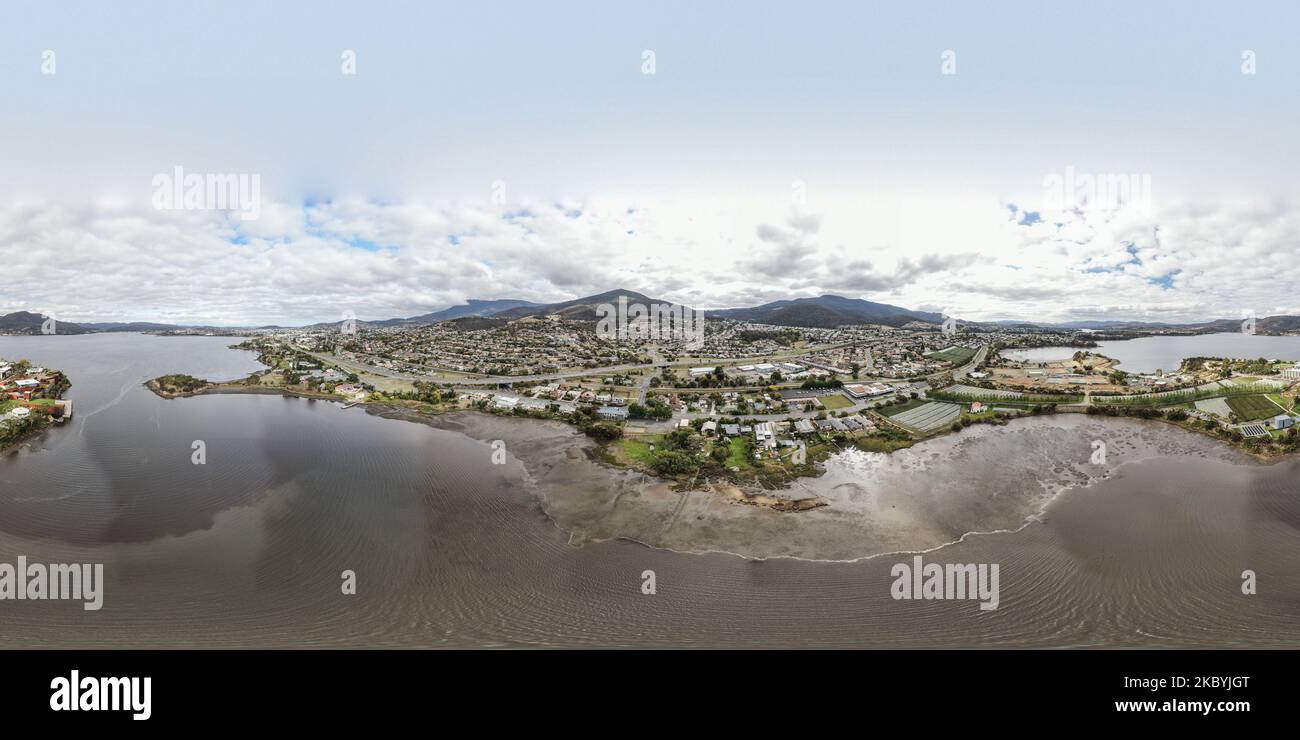 A Bird's Eye View Of Hobart city houses by water in Australia under