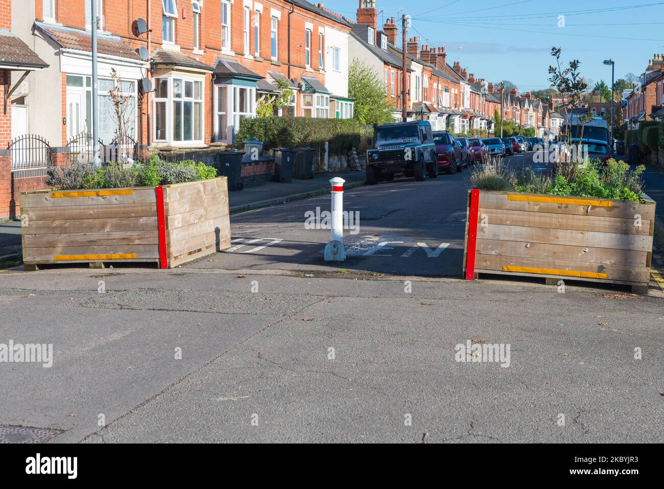 Bollards and planters marking a car free low traffic neighbourhood or ltn in Kings Heath, Birmingham Stock Photo