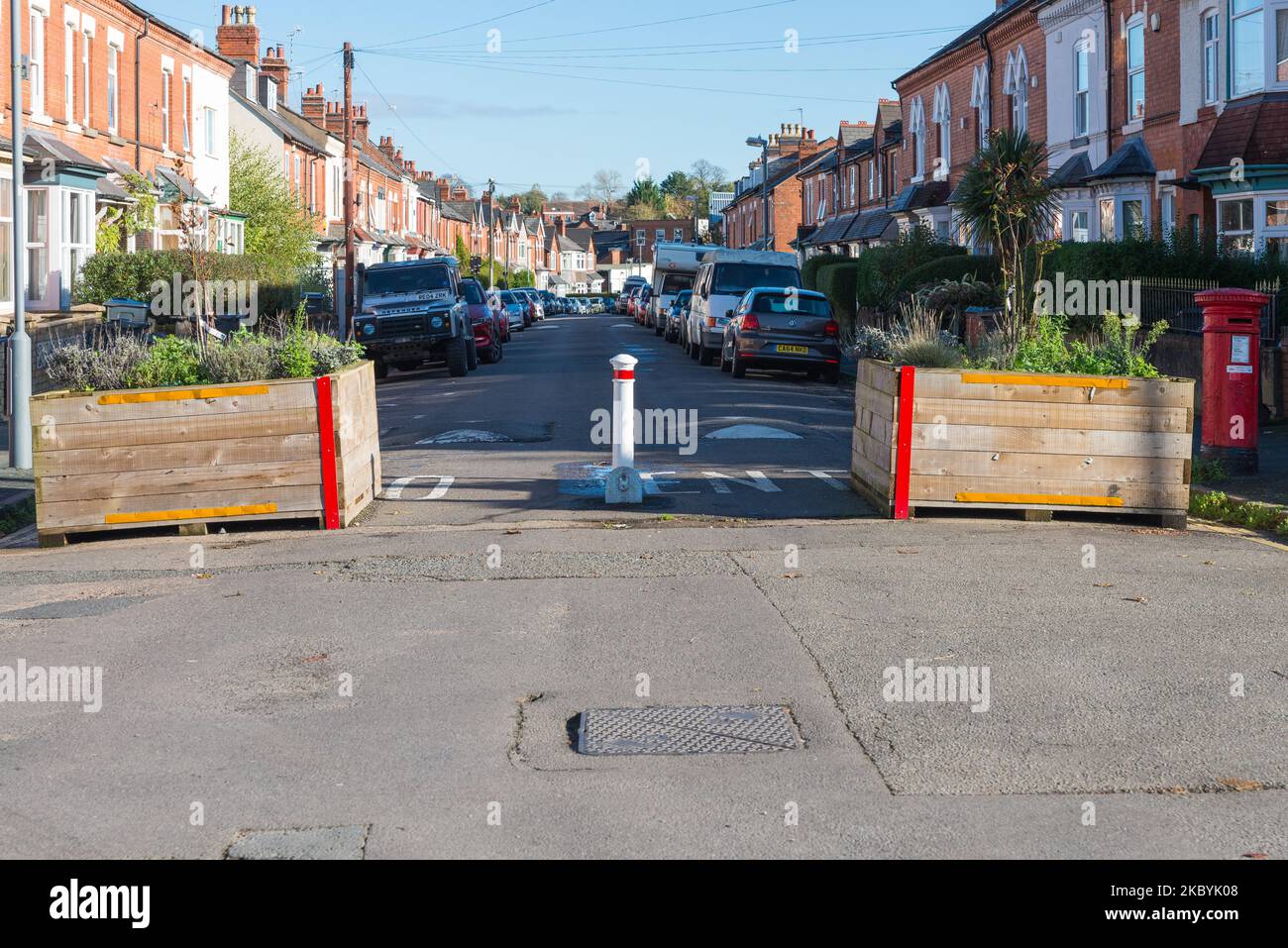 Bollards and planters marking a car free low traffic neighbourhood or ltn in Kings Heath, Birmingham Stock Photo