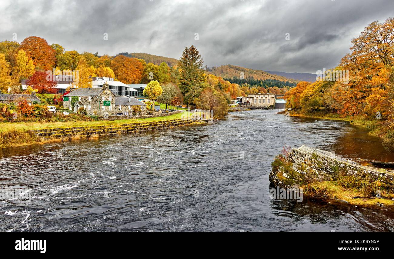 Pitlochry Perthshire Scotland river Tummel dam and the Festival theatre the Port na Craig restaurant with trees in autumnal colours Stock Photo