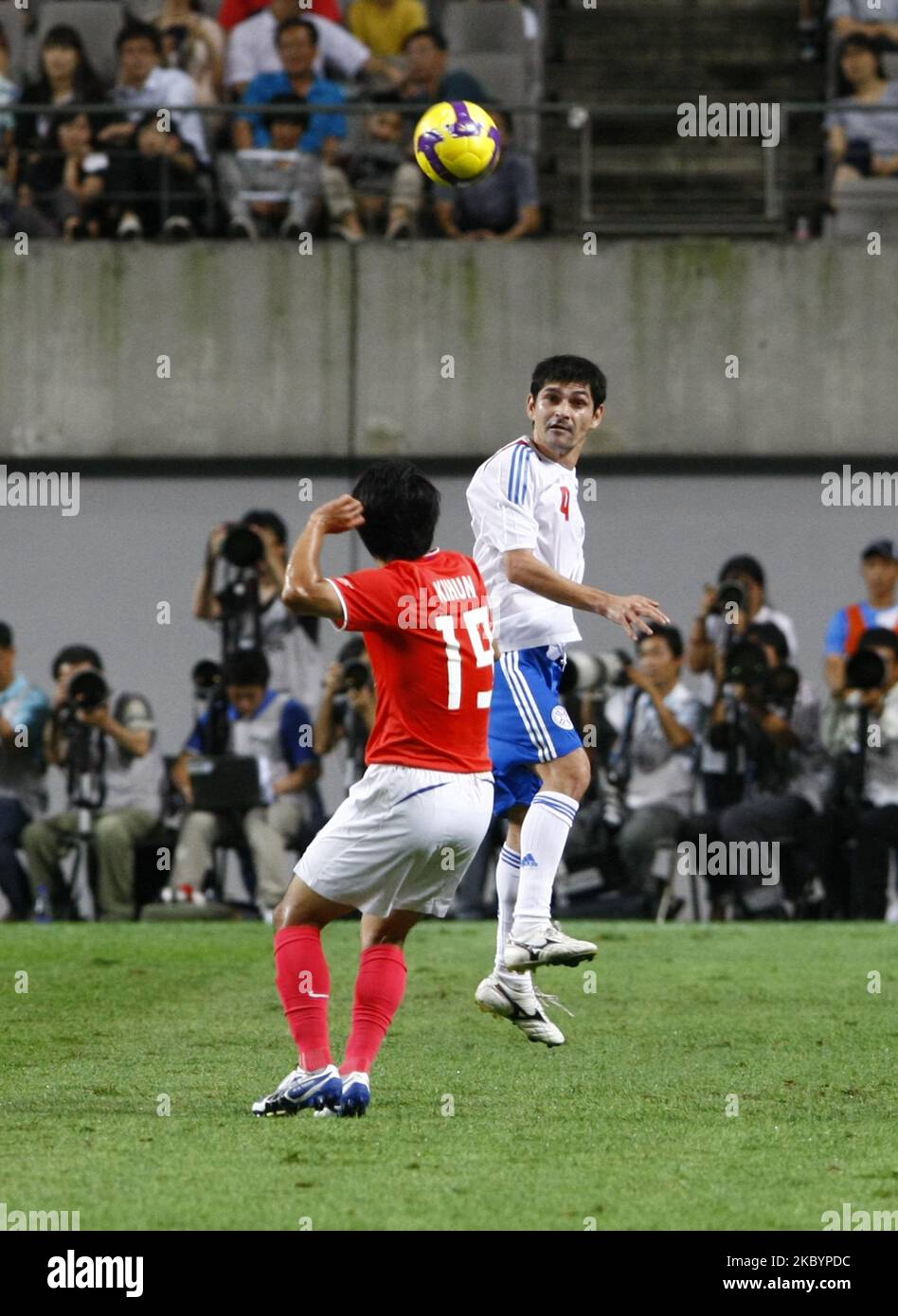 Yeom Ki-Hun(front), South Korea, and Denis Caniza, Paraguay, compete for the ball during the international friendly match between South Korea and Paraguay at Seoul Worldcup stadium on August 12, 2009 in Seoul, South Korea. (Photo by Seung-il Ryu/NurPhoto) Stock Photo
