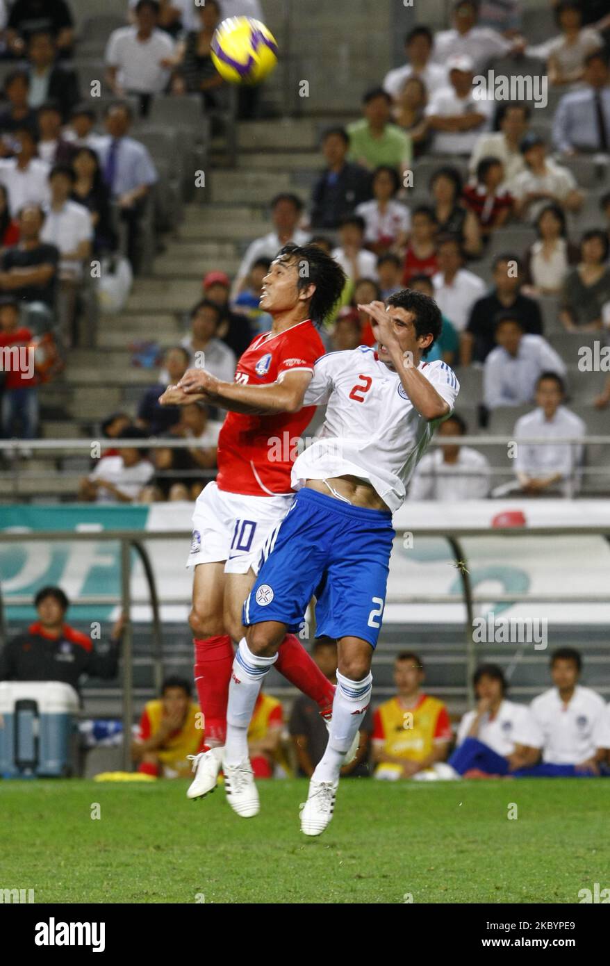 Park Chu-Young(l), South Korea, and Marcos Caceres, Paraguay, compete for the ball during the international friendly match between South Korea and Paraguay at Seoul Worldcup stadium on August 12, 2009 in Seoul, South Korea. (Photo by Seung-il Ryu/NurPhoto) Stock Photo