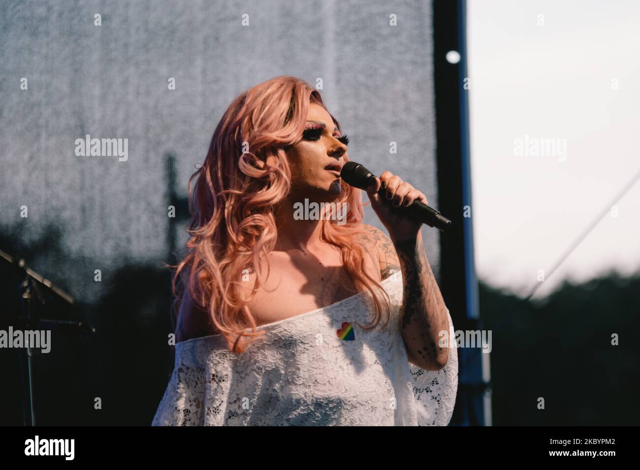 Singer Marcella Rockefeller sings during the outdoor concert held at