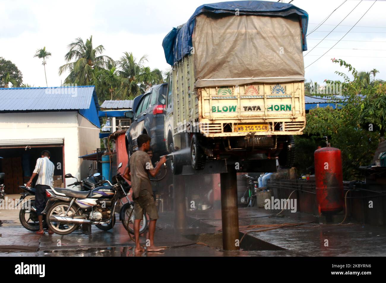 A man sensitization a mini truck in Kolkata, India on September 12