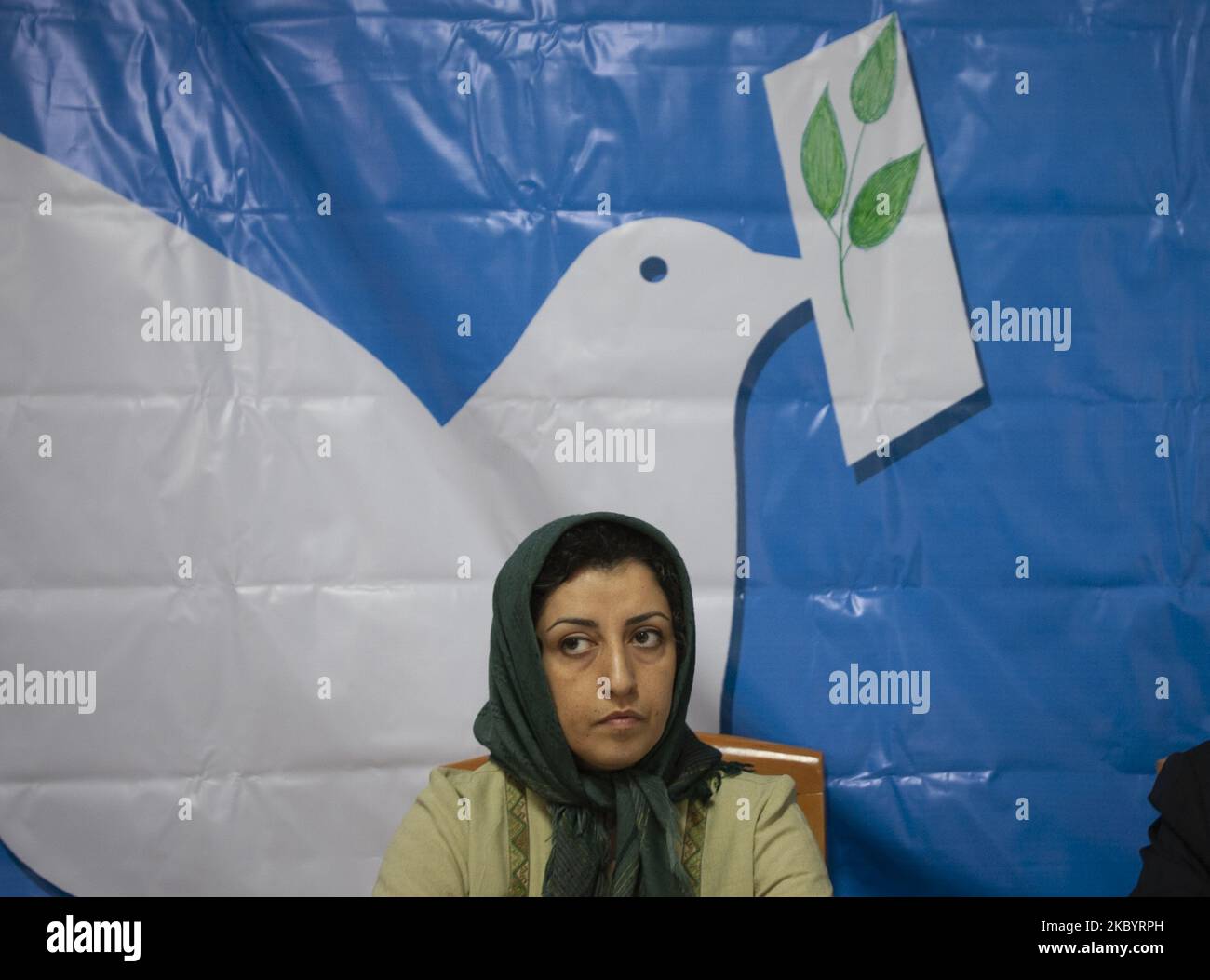 Iranian female human rights activist, Narges Mohammadi, looks on while attending a session in the former office of the Defenders of Human Rights Association in central Tehran, Iran on November 19, 2007. The group of 16 experts expressed grave concerns that Ms. Mohammadi appears to have contracted COVID-19 in Zanjan Prison. Ms. Mohammadi has been in detention since 2015 on charges that stem from her human rights work. She received a combined 16-year prison sentence in May 2016, of which she will need to serve 10 years under Iranian law, According to the office of the High Commissioners of the U Stock Photo