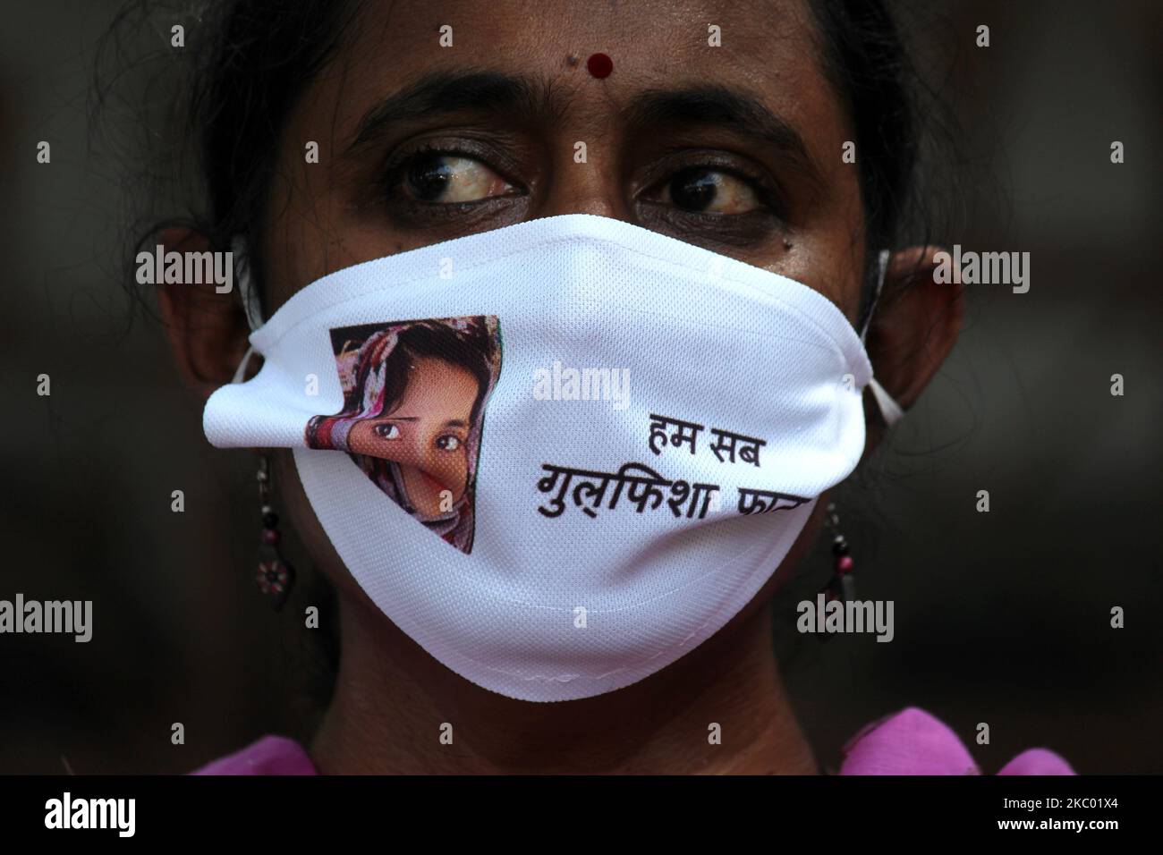 Kavita Krishnan, Communist Party of India (Marxist-Leninist) Liberation, or CPI (ML) leader, wearing mask with face of Gulfisha Fatim- arrested student activist to show solidarity during a press conference organised on Delhi Police's investigation into the February violence at Press Club of India on September 16, 2020 in New Delhi. The press conference was attended by former member of the Planning Commission Syeda Hameed, Supreme Court (SC) lawyer Prashant Bhushan, senior journalist Pamela Philipose, and former Delhi University Teachers' Association (DUTA) president Nandita Narain. (Photo by M Stock Photo