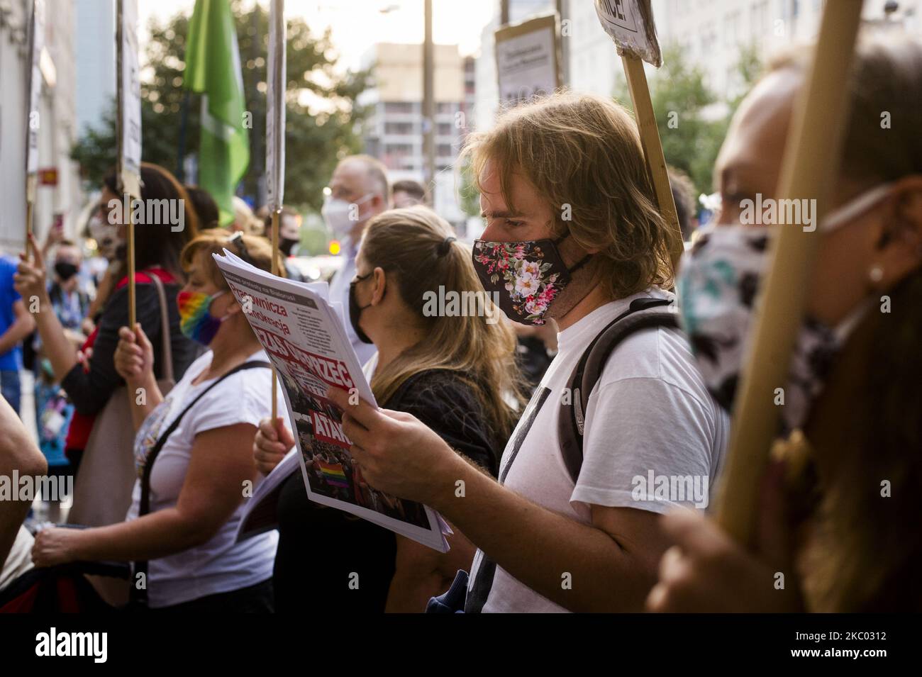 After Moria refugee camp burned to the ground in Greece, a group of pro-refugee and anti-rascism activists and their supporters gathered in Warsaw, Poland, on September 16, 2020 to show solidarity with Moria refugees.(Photo by Piotr Lapinski/NurPhoto) Stock Photo