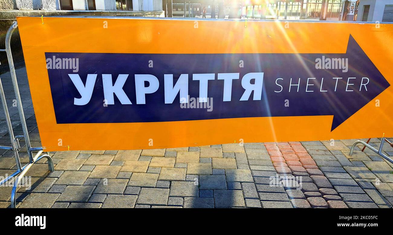 Russia war against Ukraine. Pointer in Ukrainian language bomb