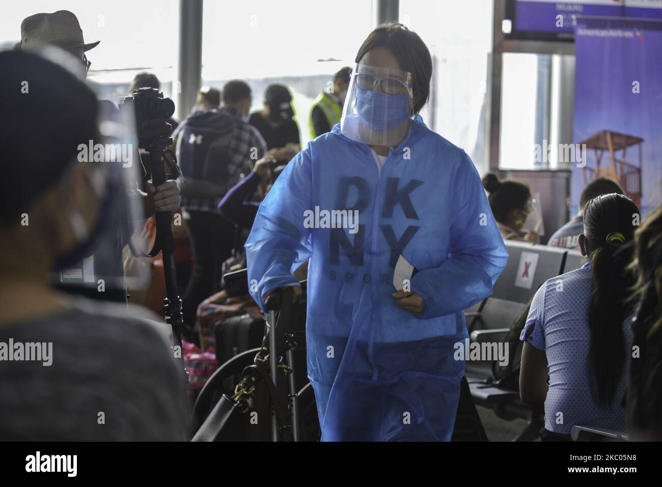 A tourist travels with special anti-pandemic clothing at La Aurora International Airport, in Guatemala City, Guatemala on Friday, September 18. The airport opens its international flight operations, and remained closed for 6 months to prevent the spread of COVID-19. During the pandemic, 84,344 people were infected and 3,076 died. (Photo by Deccio Serrano/NurPhoto) Stock Photo