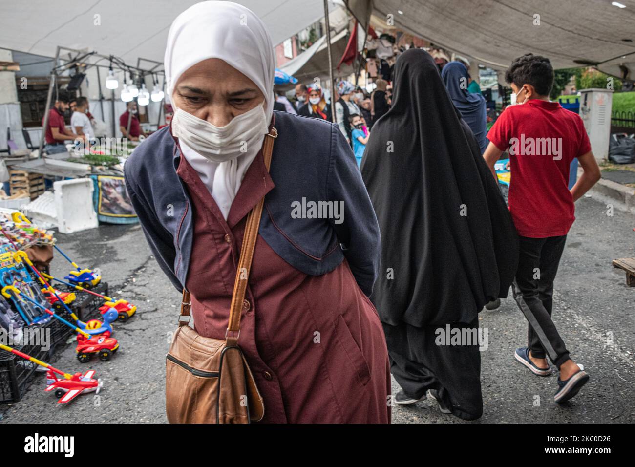 Turkish people wearing face masks went about routine activities amid