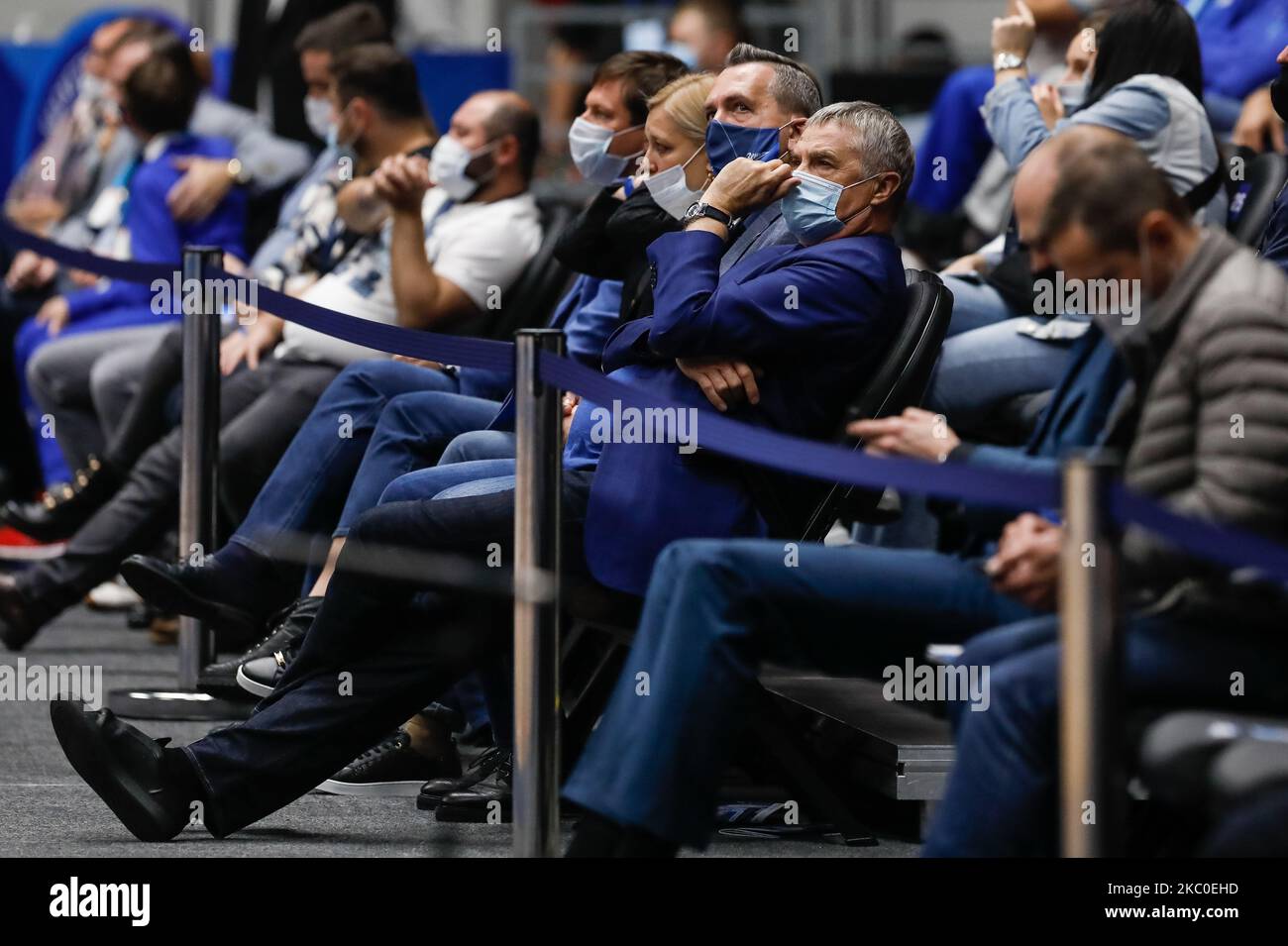 Deputy Chairman of the Management Committee of Gazprom and president of the club Zenit Alexander Medvedev (C) is seen wearing mask as he attends the VTB United League basketball match between BC Zenit St Petersburg and Stelmet Enea BC Zielona Gora on September 23, 2020 at Sibur Arena in Saint Petersburg, Russia. (Photo by Mike Kireev/NurPhoto) Stock Photo