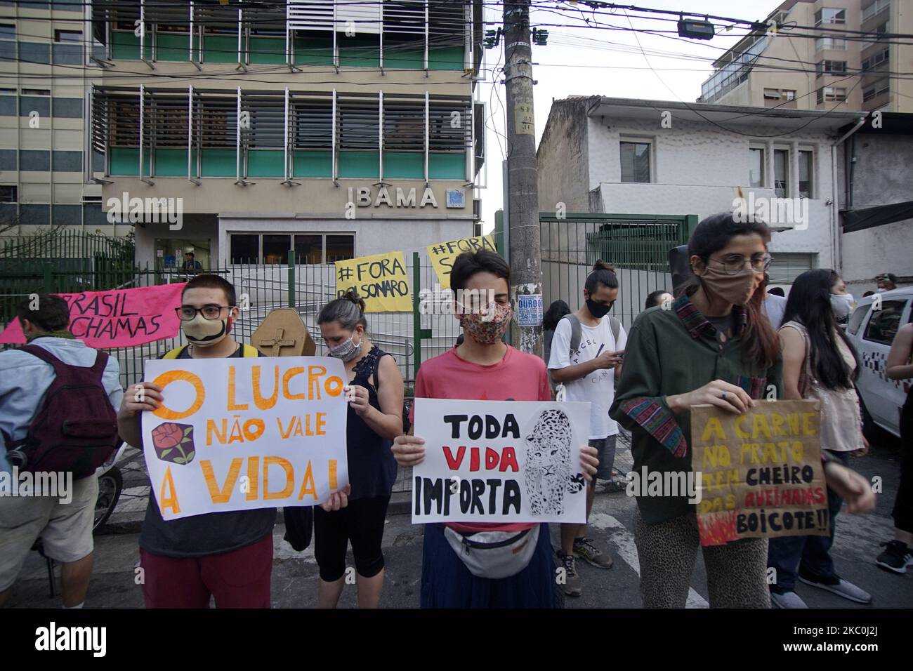 People protest during Global Climate Action Day at the Brazilian