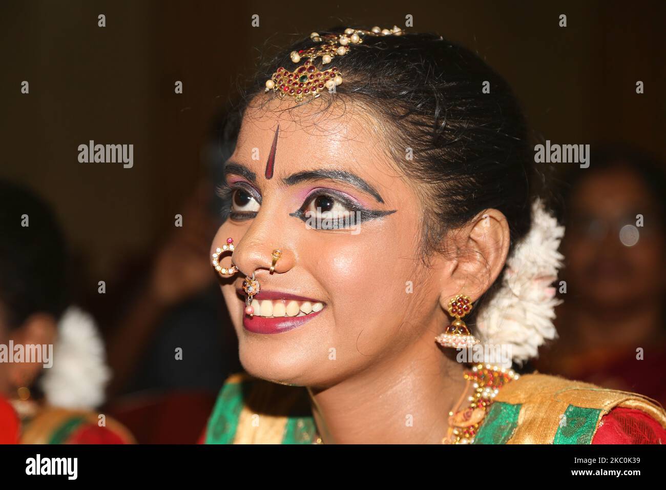 Tamil girl dressed in traditional attire waits to perform a Bharathnatyam dance during a special cultural program featuring Tamil children who were orphaned during the civil war in Jaffna, Sri Lanka, on August 12, 2017. This is just one of the many reminders of the deep scars caused during the 26-year long civil war between the Sri Lankan Army and the LTTE (Liberation Tigers of Tamil Eelam). The United Nations estimates about 40,000 people were killed during the war. (Photo by Creative Touch Imaging Ltd./NurPhoto) Stock Photo
