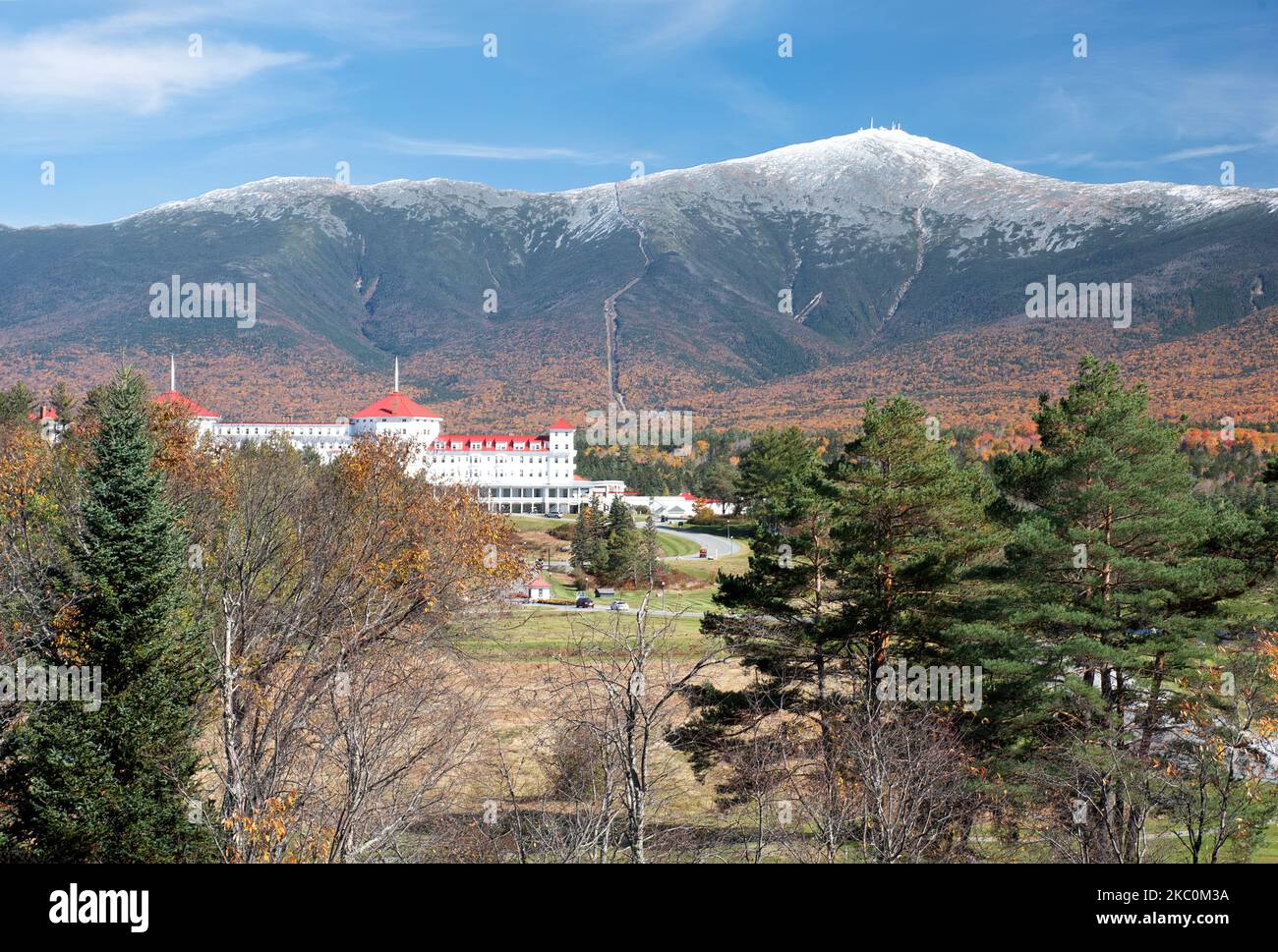 Autumn scene at Bretton Woods, New Hampshire. Blue sky with snow on