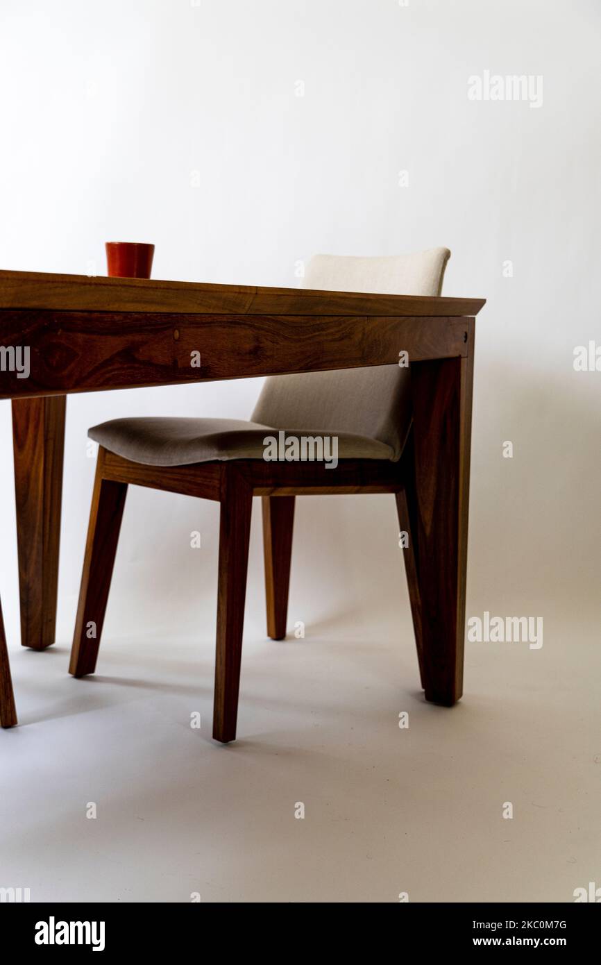 Detail of a wooden glued joint of a chairs leg. Material used for the