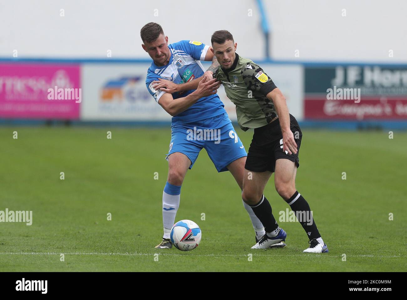 Scott Quigley of Barrow and Tommy Smith of Colchester United during the Sky Bet League 2 match between Barrow and Colchester United at the Holker Street, Barrow-in-Furness, England, on September 26, 2020. (Photo by Mark Fletcher MI News/NurPhoto) Stock Photo