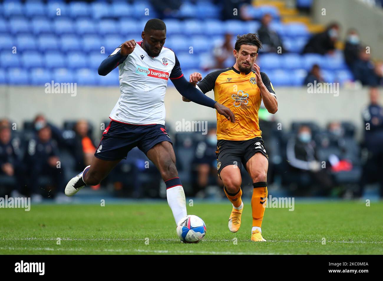 Boltons Ricardo Almeida Santos battles with Newports Ryan Haynes during the Sky Bet League 2 match between Bolton Wanderers and Newport County at the Reebok Stadium, Bolton, England on 26th September 2020. (Photo by Chris Donnelly/MI News/NurPhoto) Stock Photo