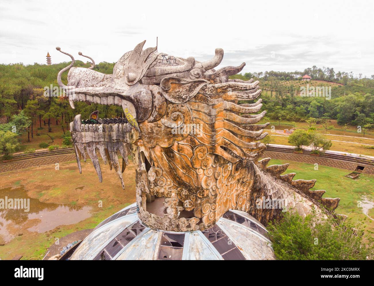 A statue of a dragon in e Thuy Tien Lake abandoned water park Stock Photo