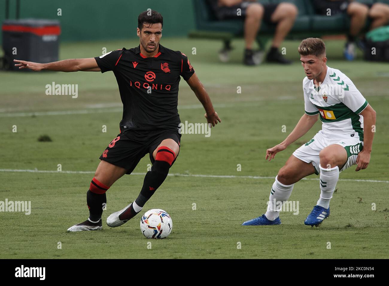 Mikel Merino of Real Sociedad and Raul Guti of Elche controls the ball during the La Liga Santader match between Elche CF and Real Sociedad at Estadio Martinez Valero on September 27, 2020 in Elche, Spain. (Photo by Jose Breton/Pics Action/NurPhoto) Stock Photo