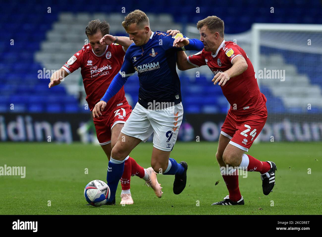 Oldham's Danny Rowe and Crawley Town's Dannie Bulman and Tony Craig in action during the Sky Bet League 2 match between Oldham Athletic and Crawley Town at Boundary Park, Oldham, England on 26th September 2020. (Photo by Eddie Garvey/MI News/NurPhoto) Stock Photo