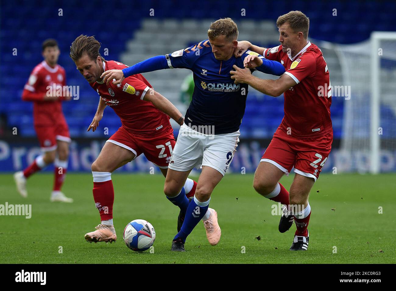 Oldham's Danny Rowe and Crawley Town's Dannie Bulman and Tony Craig in action during the Sky Bet League 2 match between Oldham Athletic and Crawley Town at Boundary Park, Oldham, England on 26th September 2020. (Photo by Eddie Garvey/MI News/NurPhoto) Stock Photo