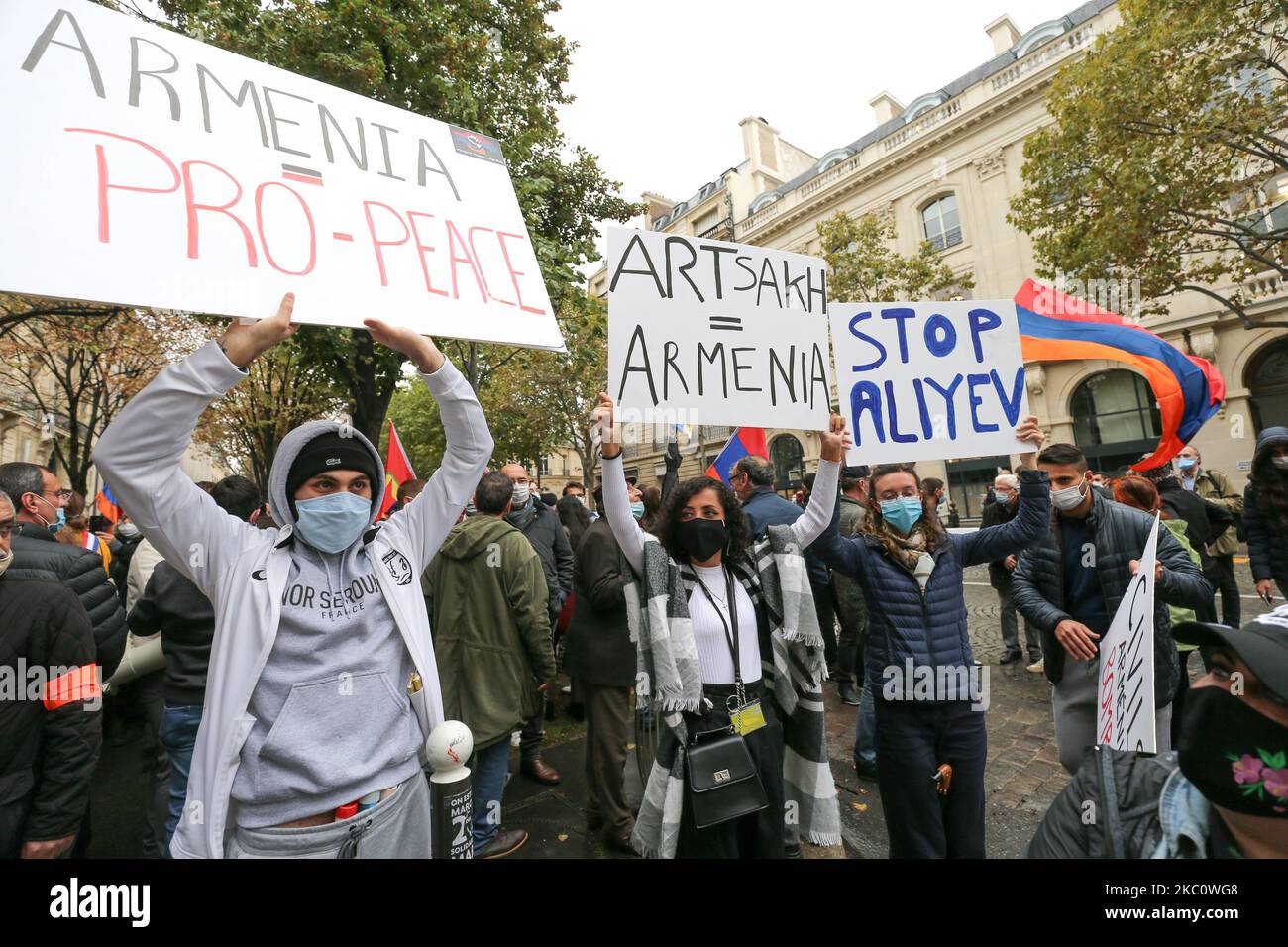 Women hold signs during a demonstration of Armenians in front of the Azerbaijan ambassy in Paris, France, on September 29, 2020 against the Azerbayan attacks on Nagorno Karabakh. (Photo by Michel Stoupak/NurPhoto) Stock Photo
