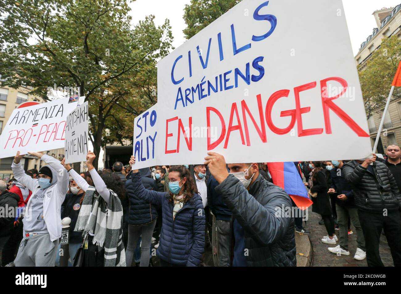Women hold signs during a demonstration of Armenians in front of the Azerbaijan ambassy in Paris, France, on September 29, 2020 against the Azerbayan attacks on Nagorno Karabakh. (Photo by Michel Stoupak/NurPhoto) Stock Photo
