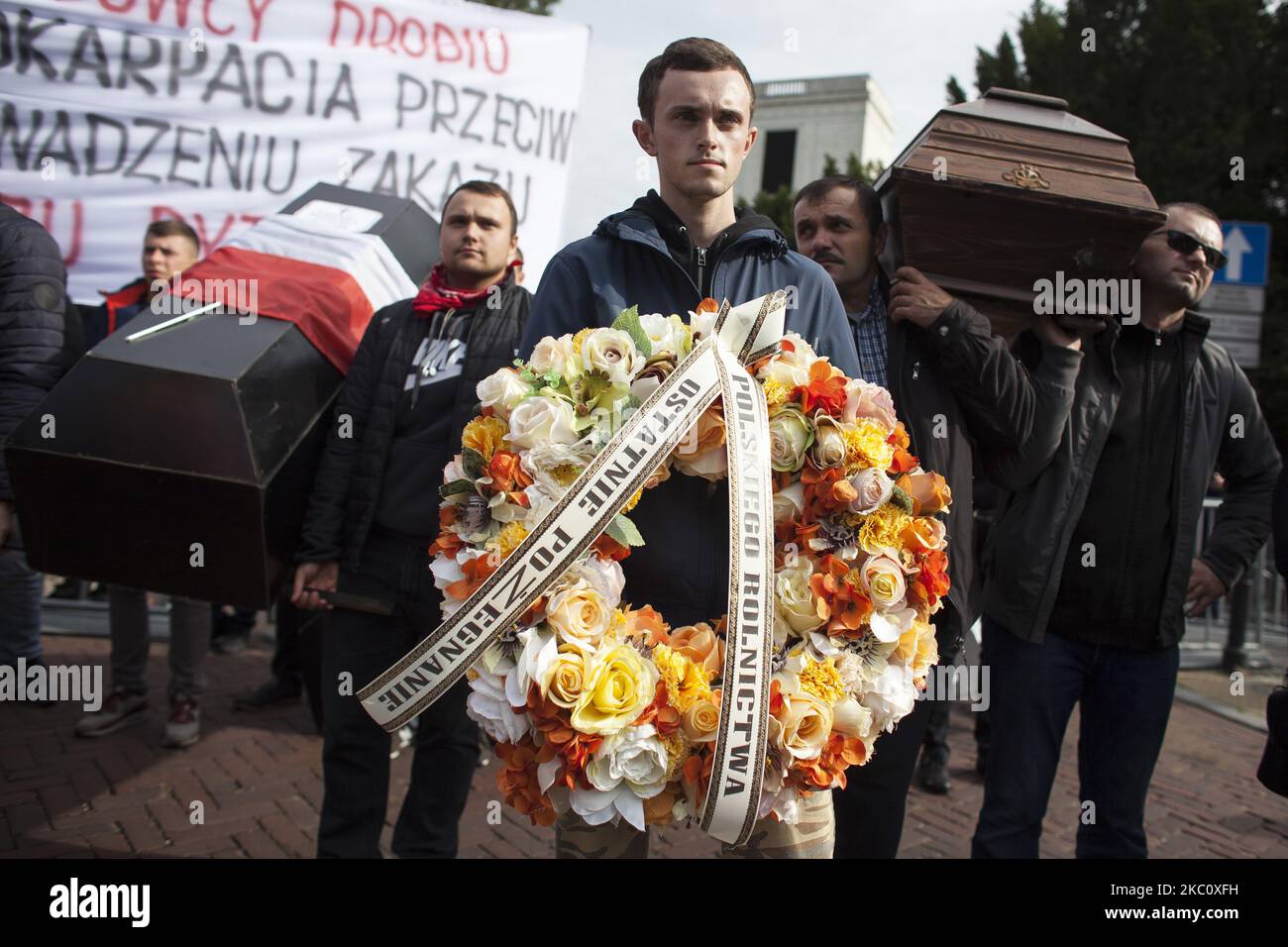 Farmers hold funeral wreaths and coffins during farmers strike against new Piatka Dla Zwierzat bill in Warsaw, Poland, on September 30, 2020. (Photo by Maciej Luczniewski/NurPhoto) Stock Photo