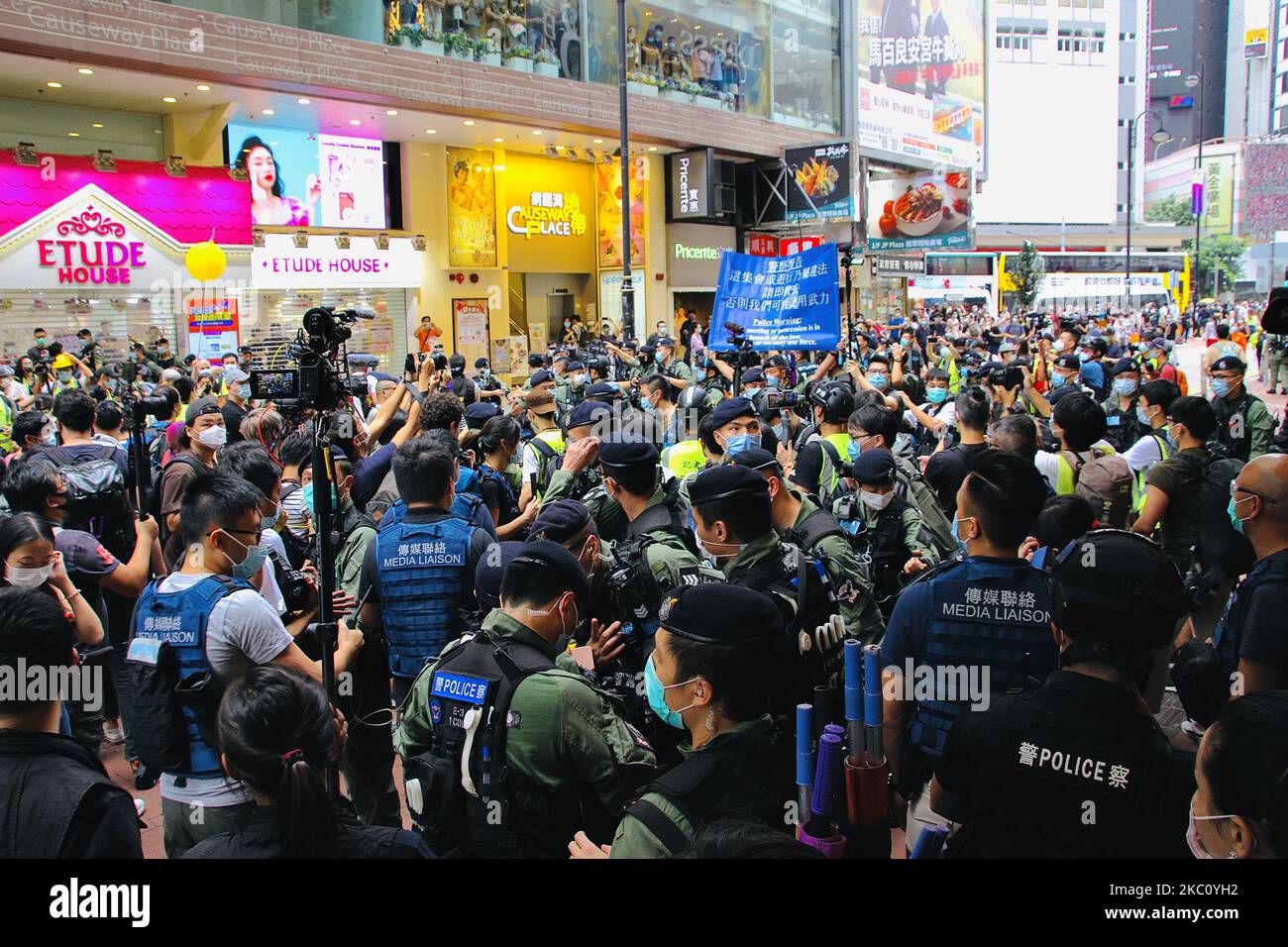 Police attempt to control the media during China National Day demonstrations in Hong Kong, China, on 1st October 2020. (Photo by Tommy Walker/NurPhoto) Stock Photo
