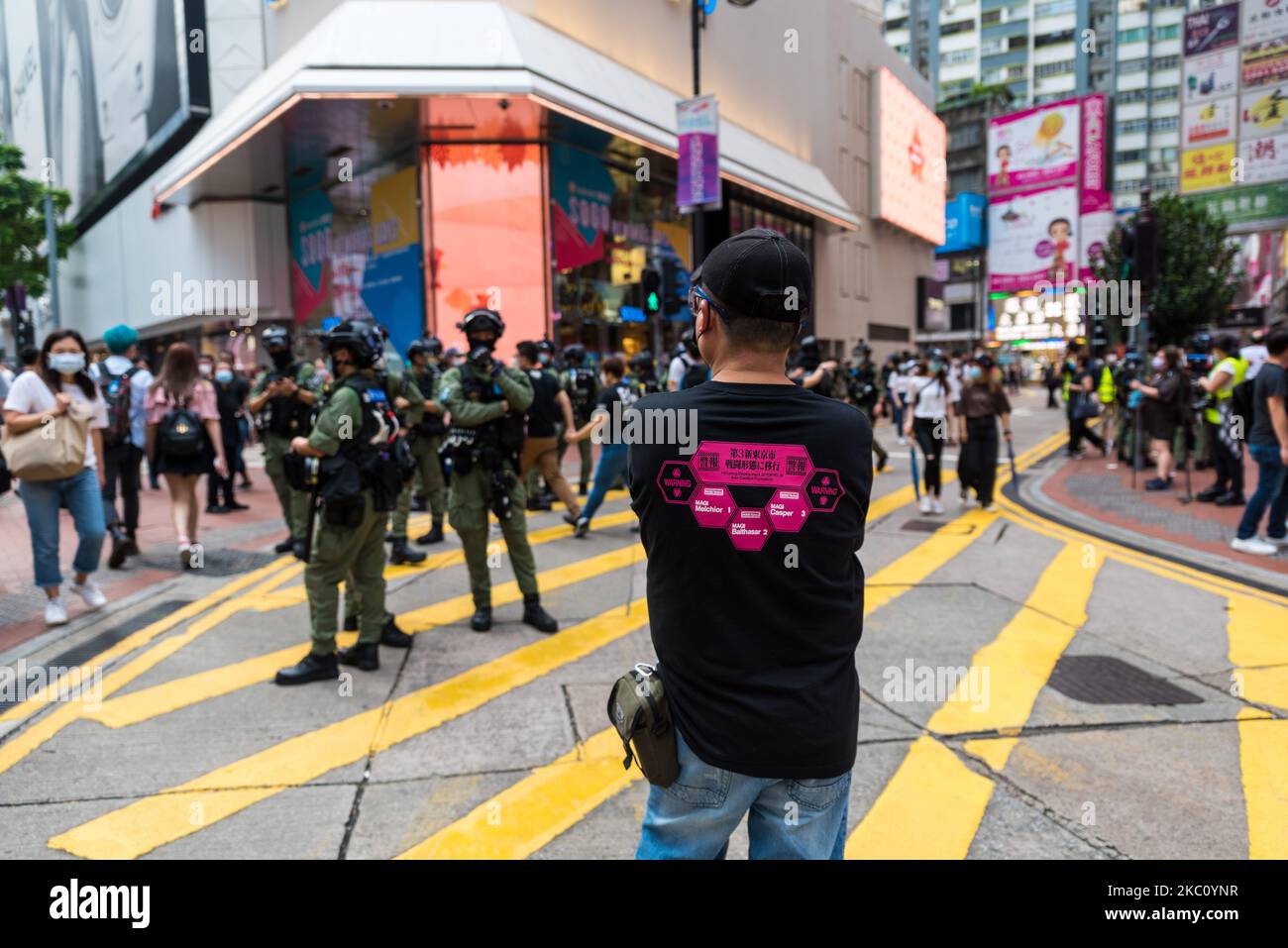 A man stands defiantly in front of riot police in Causeway Bay in Hong ...
