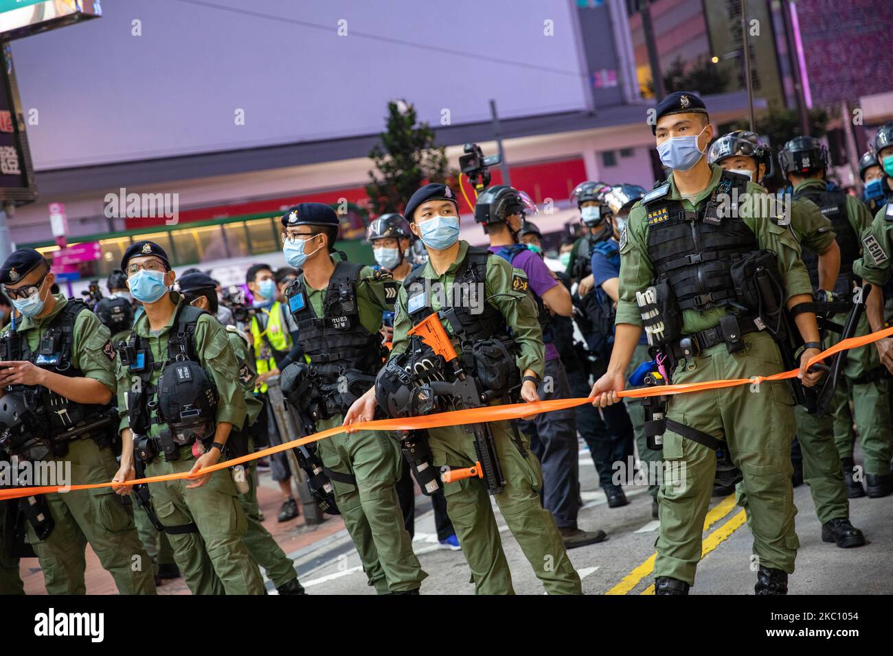 Riot policemen mans a cordon in Hong Kong, China, on October 1, 2020 ...