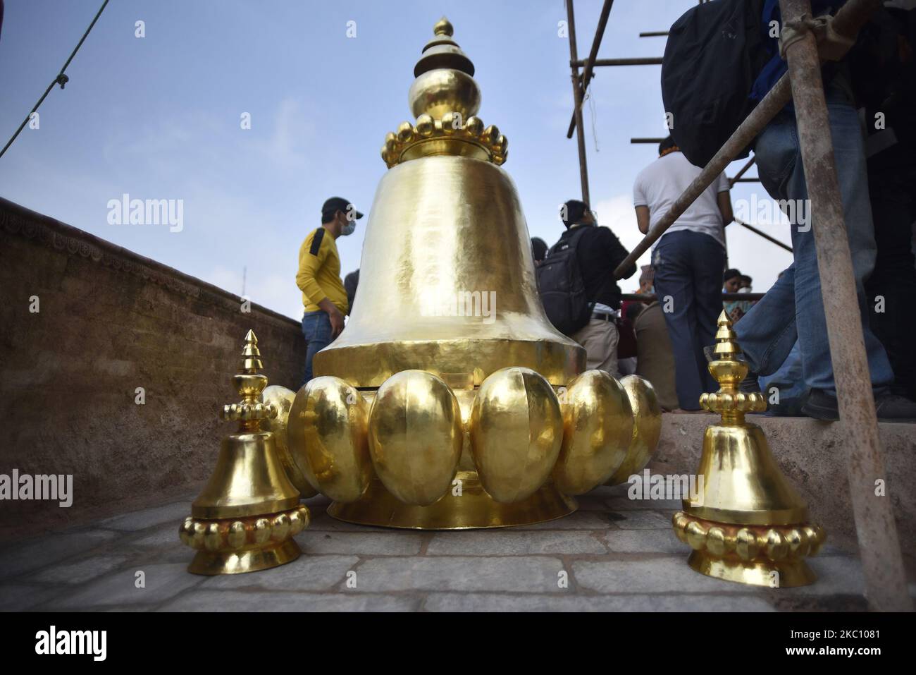 Nepalese people brought pinnacle to put on the top of Rani Pokhari's Bal Gopaleshwar temple after the reconstruction at Kathmandu, Nepal on Thursday, October 1, 2020. The temple which destroyed during 2015 earthquake and recently rebuilt in the original Malla-era Shikar style. (Photo by Narayan Maharjan/NurPhoto) Stock Photo