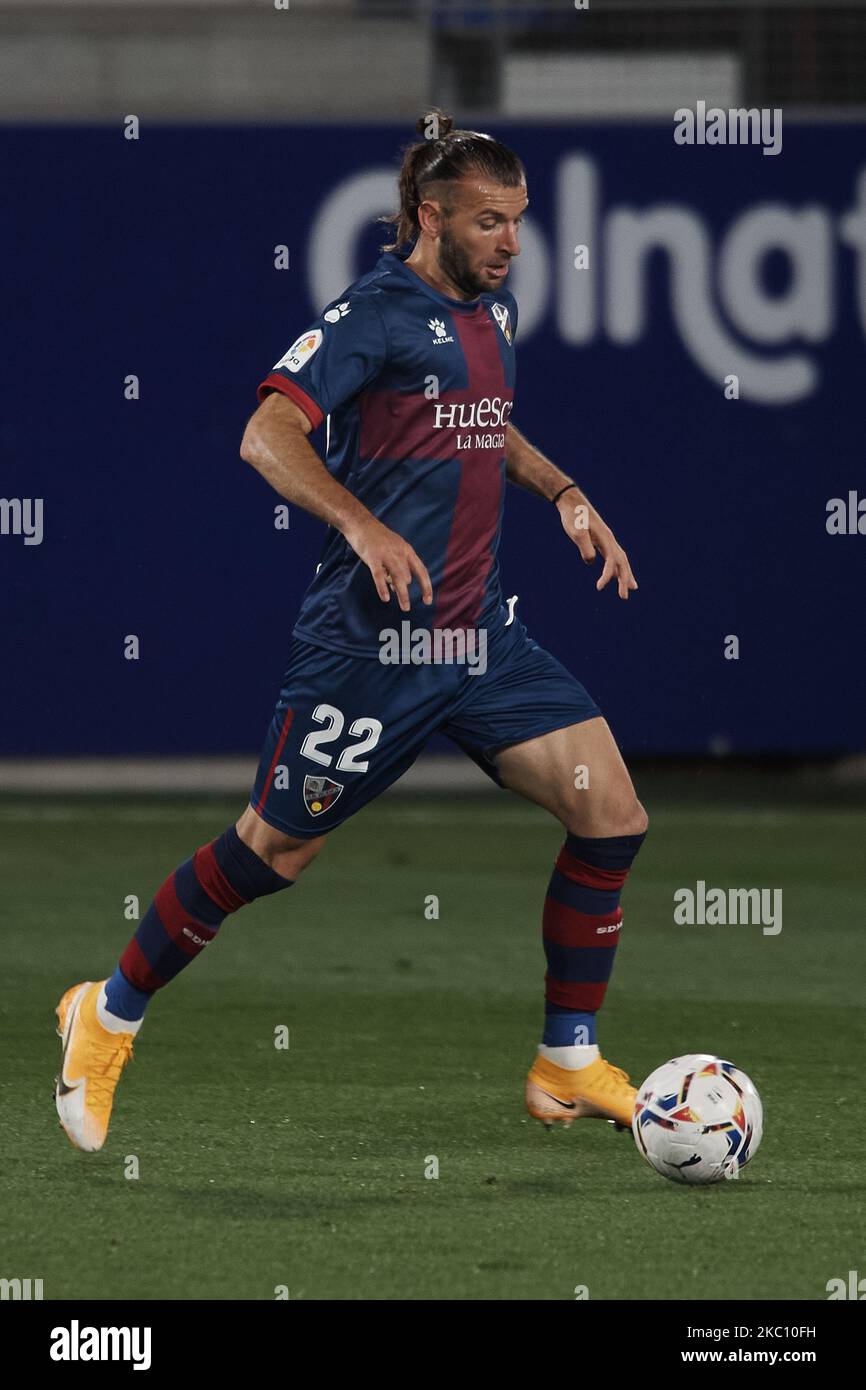Gaston Silva of Huesca controls the ball during the La Liga Santander match between SD Huesca and Atletico de Madrid at Estadio El Alcoraz on September 30, 2020 in Huesca, Spain. Football Stadiums around Europe remain empty due to the Coronavirus Pandemic as Government social distancing laws prohibit fans inside venues resulting in fixtures being played behind closed doors. (Photo by Jose Breton/Pics Action/NurPhoto) Stock Photo