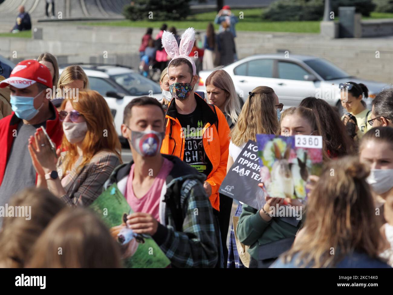 Animal rights supporters hold placards during a rally dedicated to ...