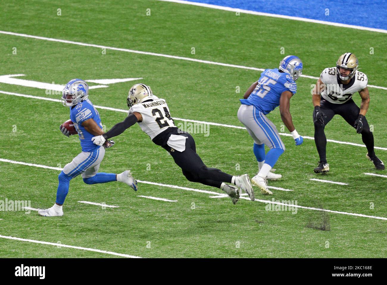 Detroit Lions safety Miles Killebrew (35) runs the ball against New Orleans Saints running back Dwayne Washington (24) during the first half of an NFL football game in Detroit, Michigan USA, on Sunday, October 4, 2020 (Photo by Jorge Lemus/NurPhoto) Stock Photo