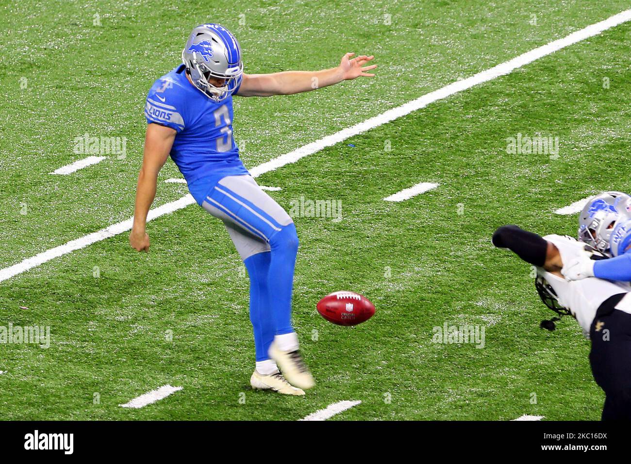 Detroit Lions punter Jack Fox (3) kicks during the second half of an