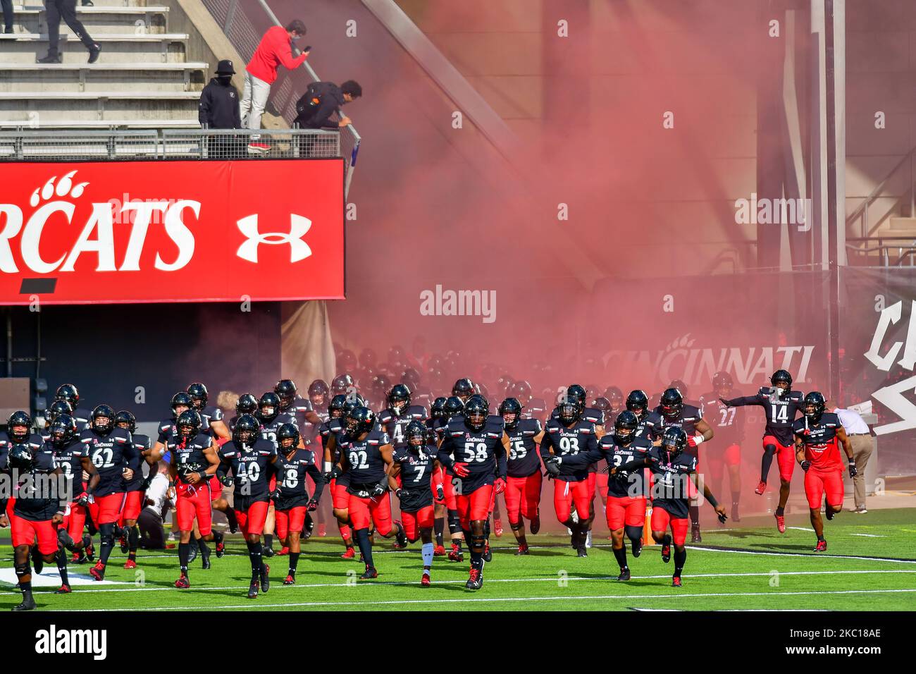 University of Cincinnati players take to the the field prior to the start of the NCAA college football game at Nippert Stadium between the University of Cincinnati Bearcats and the University of South Florida. Cincinnati defeated USF 28-7. Saturday, October 3rd, 2020, in Cincinnati, Ohio, United States. (Photo by Jason Whitman/NurPhoto) Stock Photo