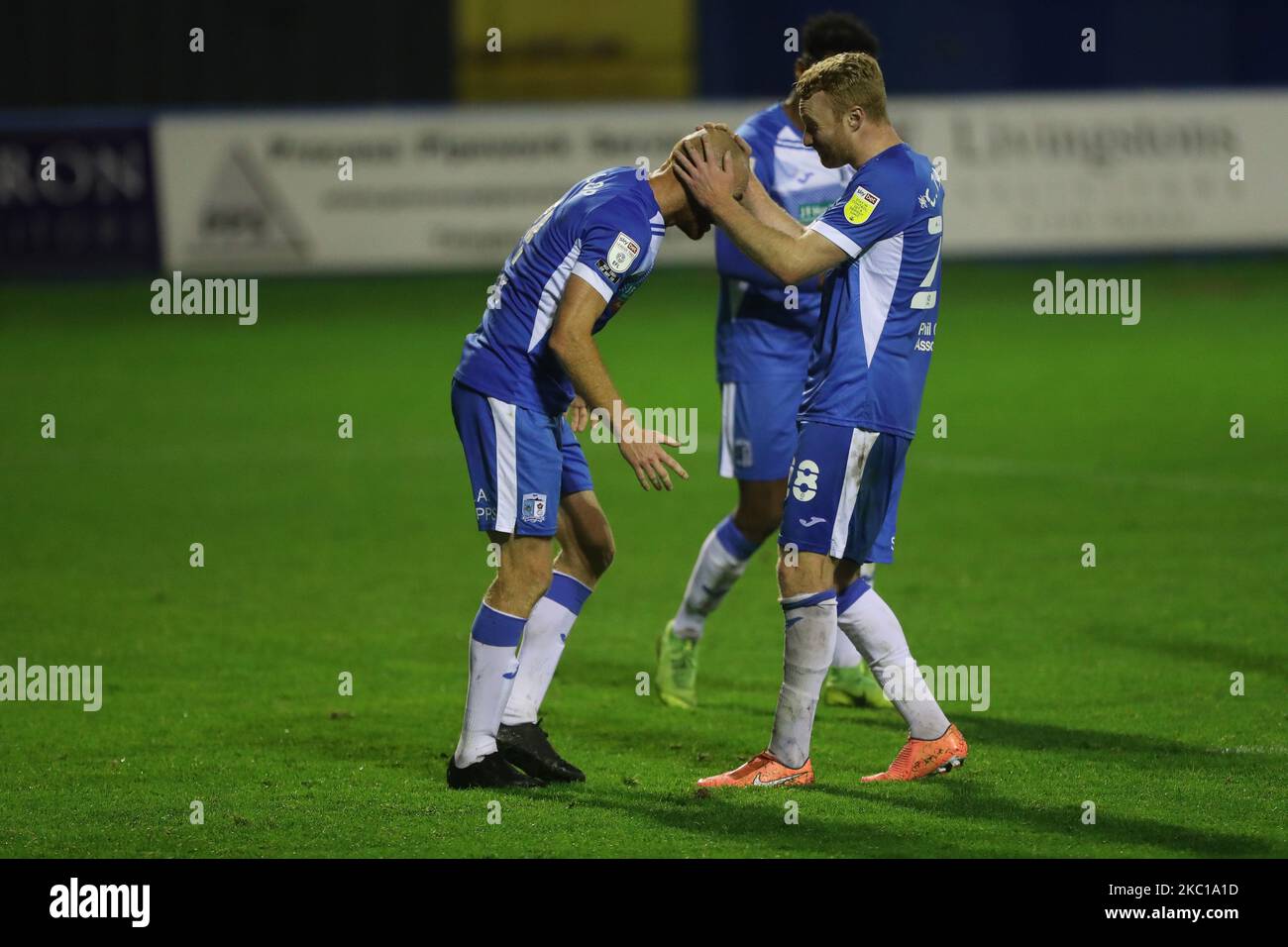 Chris Taylor of Barrow congratulates Jason Taylor after he scored their second goal during the EFL Trophy match between Barrow and Leeds United at the Holker Street, Barrow-in-Furness on 5th October 2020. (Photo by Mark Fletcher/MI News/NurPhoto) Stock Photo