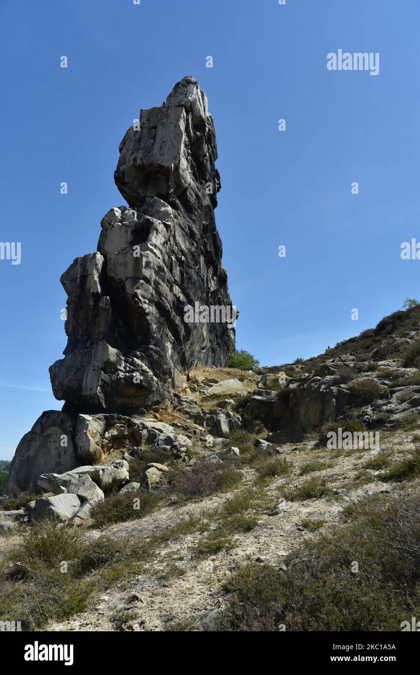 Germany Devil Rocks A vertical shot of the Teufelsmauer (Devil's Wall) rock formation in ...