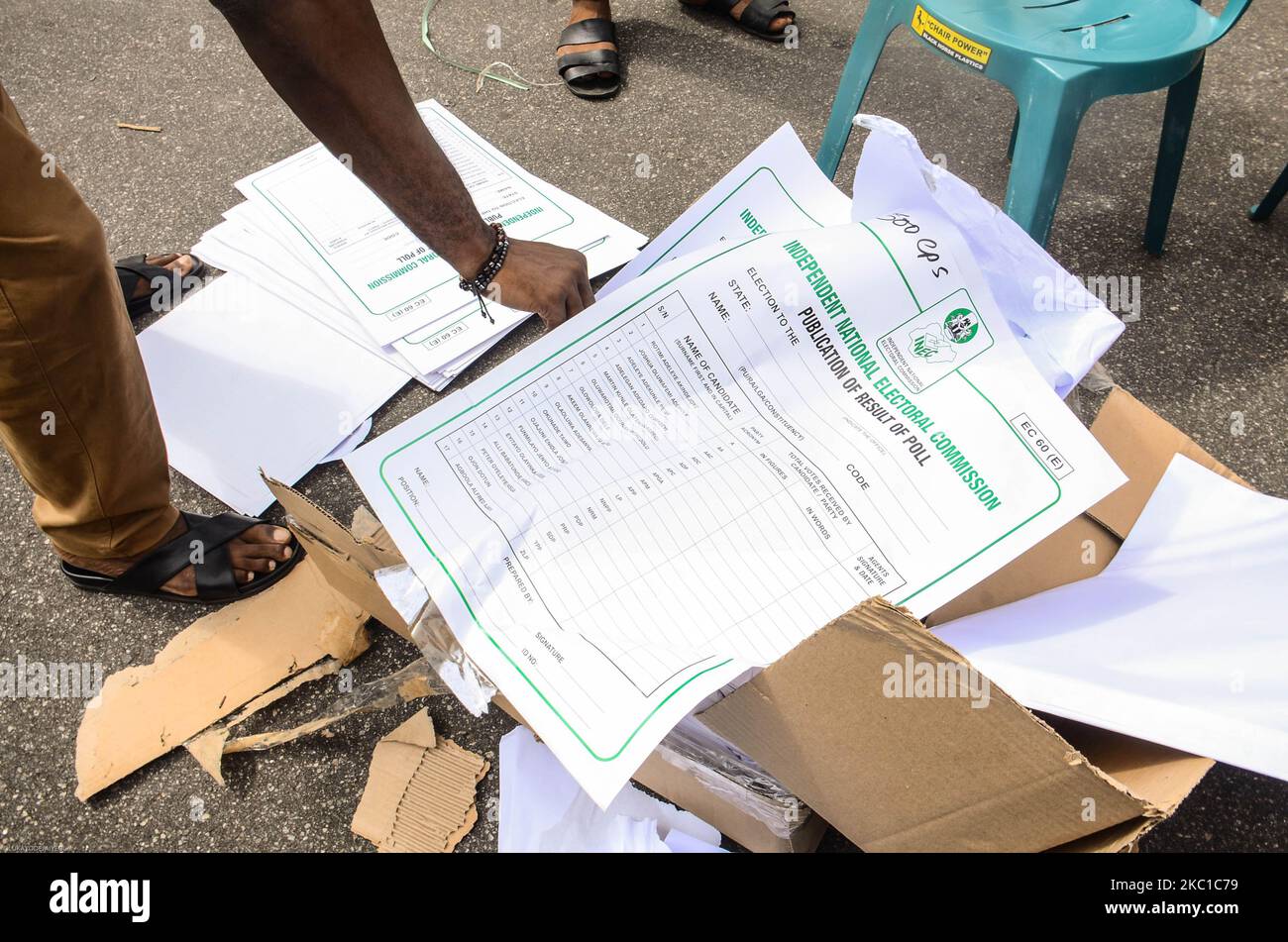 Officials of Independent National Electoral Commission sorting sensitive electoral materials, which is to distributed to different local government areas at the central Bank of Nigeria in Akure, Ondo State, on October 08, 2020. (Photo by Olukayode Jaiyeola/NurPhoto) Stock Photo
