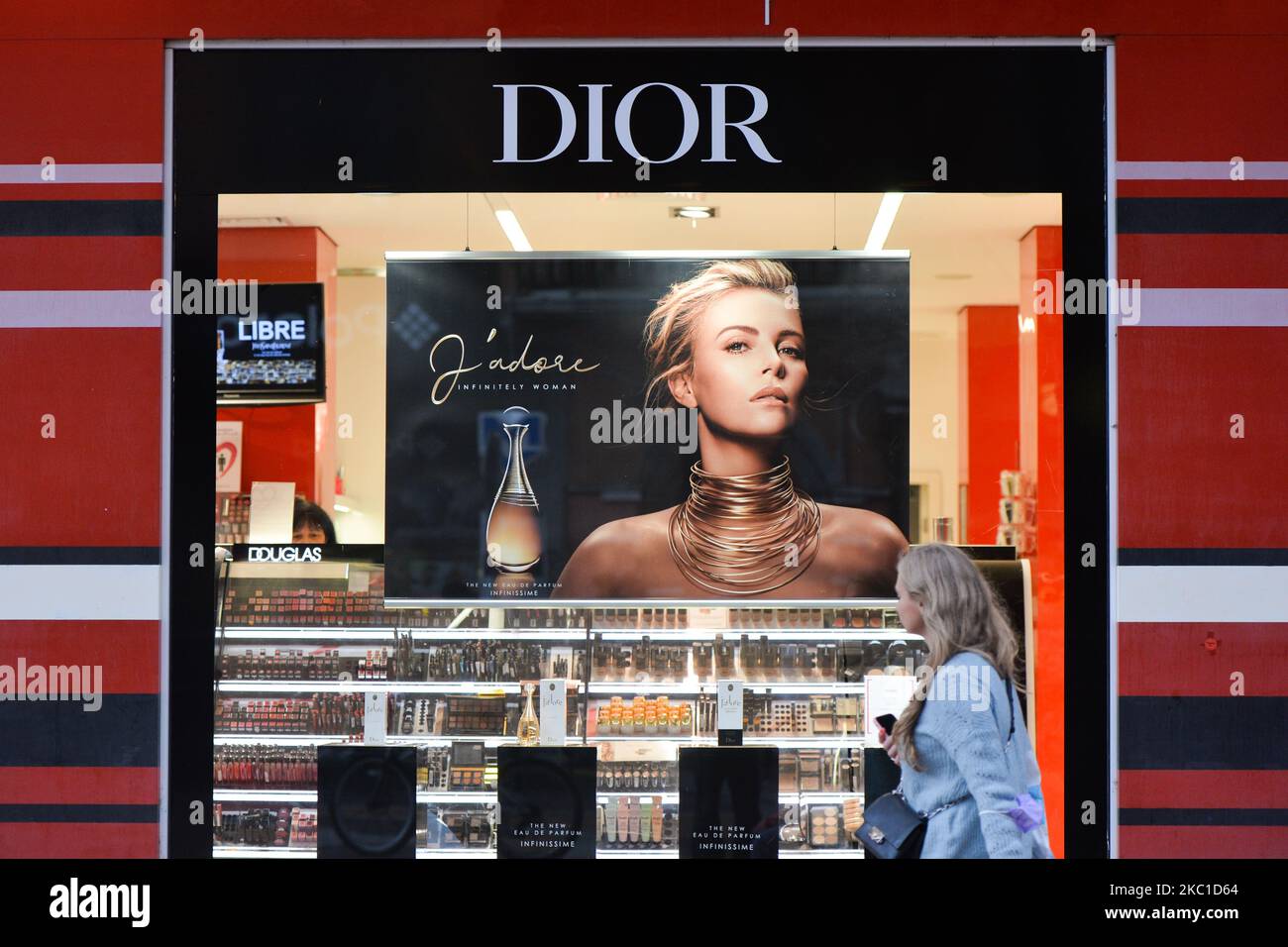 A lady passes by Christian Dior SE shop window, commonly known as Dior, a  French luxury goods company controlled and chaired by French businessman  Bernard Arnault, seen in Sofia city center. On