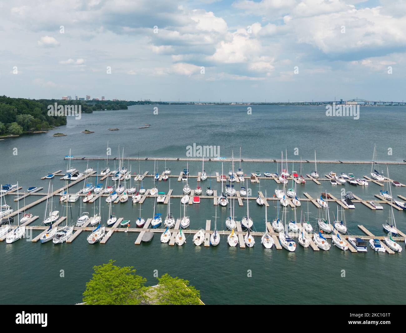 An aerial view of a boat ramp with the Hamilton bridge and a blue