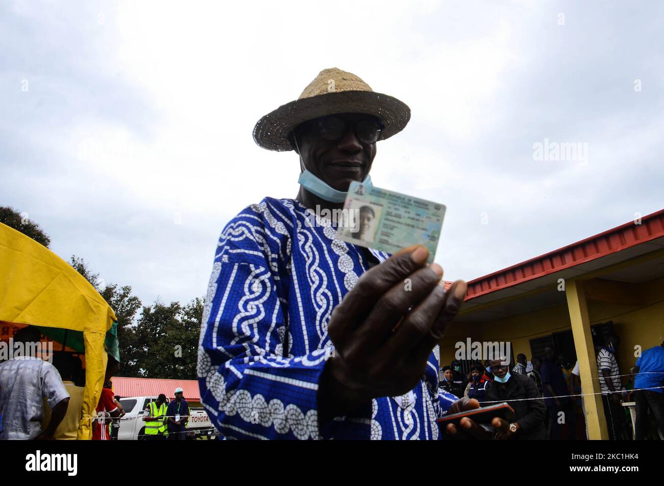 A man waits on a queue to cast his vote during the Ondo State gubernatorial election in Akure, in the Ondo State in southwest Nigeria, on October 9, 2020. (Photo by Olukayode Jaiyeola/NurPhoto) Stock Photo