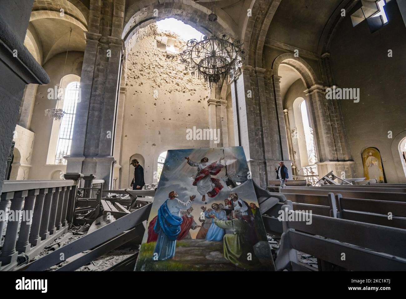 A religious destroyed painting among the destruction in the Ghazanchetsots Cathedral in Shushi, Nagorno Karabakh, after the Azerbaijan shelling in a double attack to the building on October 11, 2020. (Photo by Celestino Arce/NurPhoto) Stock Photo