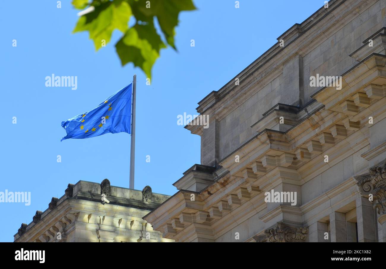 blue european flag is waving on top of german parliament building "Reichstag" Stock Photo