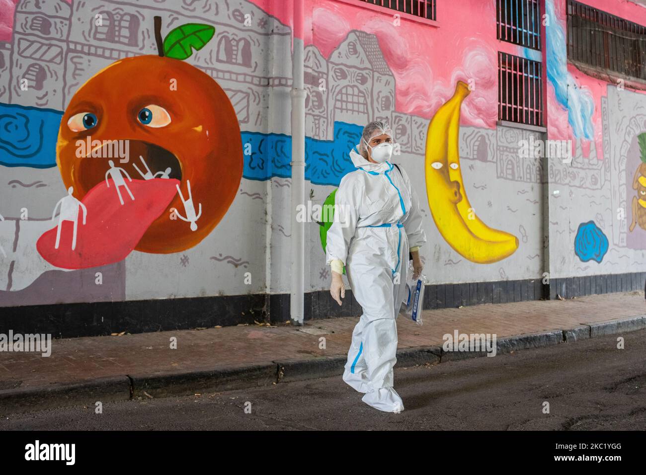 Health workers collect swab in Turin, Italy, on October 16, 2020. Many places of sanitary test are put in place to contrast the spread of Sars-cov-2 infection and prevent the second wave. In the picture one of the Covid-19 control hotspot where rhino-pharyngeal swabs are carried out for people deemed at risk after trips abroad, infections at school or in the workplace, or simply for possible contacts with infected people. (Photo by Mauro Ujetto/NurPhoto) Stock Photo